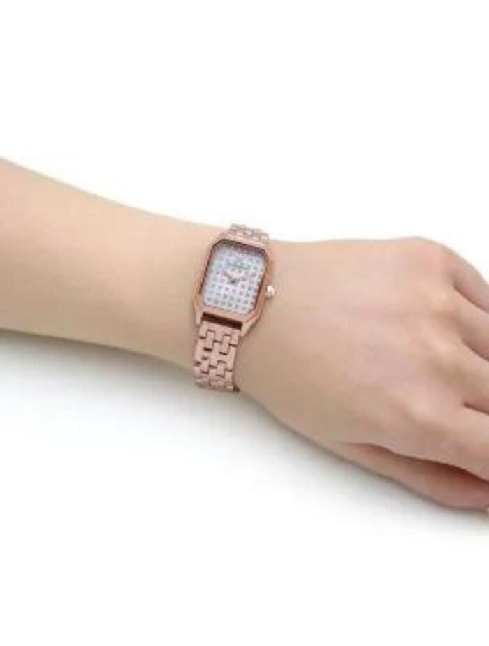 BRAND Emporio Armani ANALOGUE/DIGITAL Analogue CASE DEPTH APPROX. 6.00mm PRIMARY MATERIAL Stainless Steel CASE SHAPE Rectangle CASE WIDTH APPROX. 24.00mm CLASP TYPE Butterfly DIAL COLOUR White mother of pearl MULTIPLE TIME ZONES DISPLAY None GENDER Ladies GLASS Mineral MOVEMENT SOURCE Japan MOVEMENT Quartz STRAP COLOUR Rose Gold