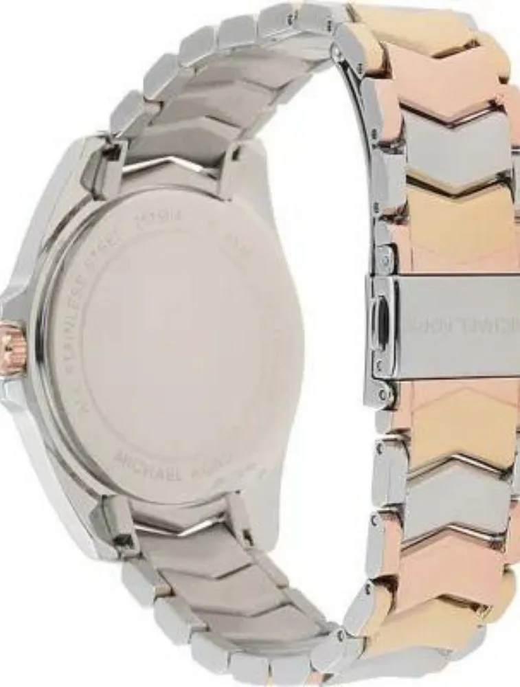 Marque: Michael Kors Modèle: Analogique Boîtier: Diamètre : 36 mm Epaisseur : 8 mm Acier inoxydable Bronze Cadran: Verre : Minéral Bronze Bracelet: Acier inoxydable Bronze Etanchéité: 50 m (5 ATM) Type de boucle: Boucle déployant