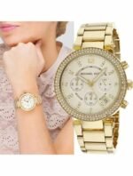 Marque: Michael Kors Modèle: Parker Boîtier: Diamètre : 39 mm Epaisseur : 12 mm Acier inoxydable Doré Cadran: Verre : Minéral Doré Bracelet: Largeur : 12 mm Acier inoxydable Doré Etanchéité: 100 m (10 ATM) Type de boucle: Boucle déployante Détails techniques: Dateur Chronomètre