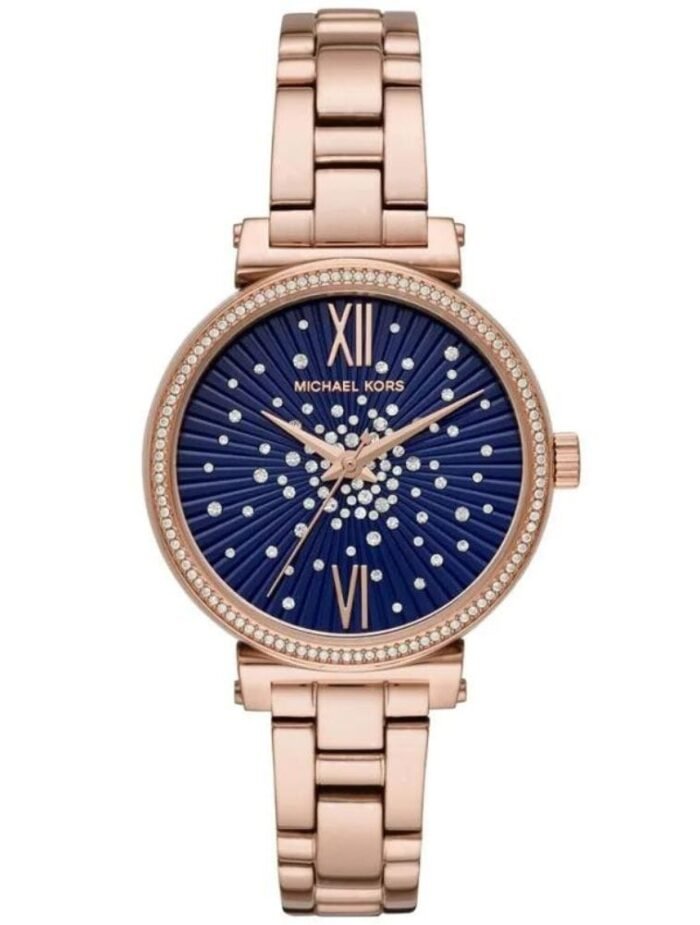 Marque: Michael Kors Modèle: Darci Boîtier: Diamètre : 36 mm Epaisseur : 7 mm Acier inoxydable Black Cadran: Verre : Minéral Black Bracelet: Largeur : 14 mm Acier inoxydable Black Etanchéité: 50 m (5 ATM) Type de boucle: Boucle déployante