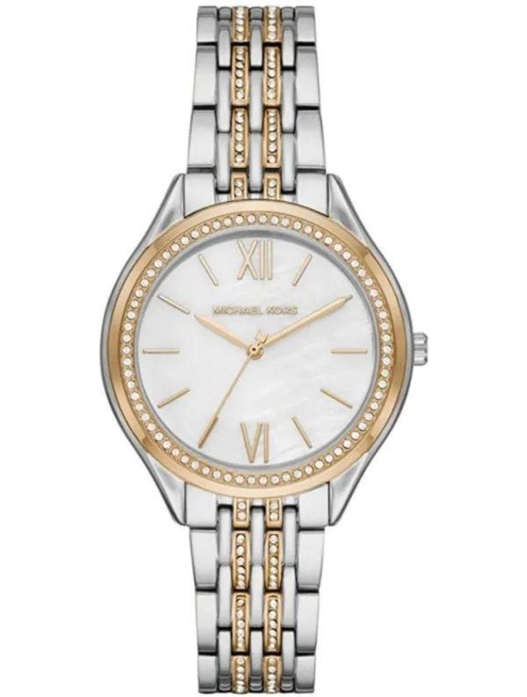 Marque: Michael Kors Modèle:RITZ Mindy Boîtier: Diamètre : 36 mm Epaisseur : 8 mm Acier inoxydable Bronze Cadran: Verre : Minéral Bronze Bracelet: Acier inoxydable Bronze Etanchéité: 50 m (5 ATM) Type de boucle: Boucle déployant