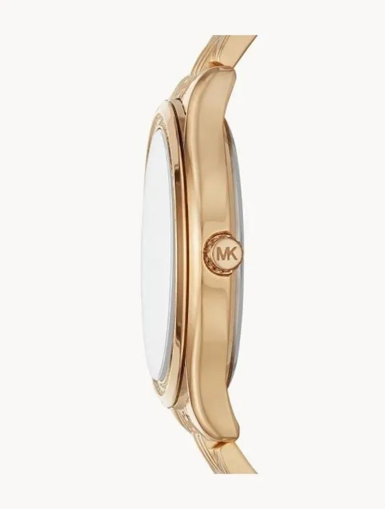 Marque: Michael Kors Modèle:RITZ Mindy Boîtier: Diamètre : 36 mm Epaisseur : 8 mm Acier inoxydable GOLD Cadran: Verre : Minéral GOLD Bracelet: Acier inoxydable Bronze Etanchéité: 50 m (5 ATM) Type de boucle: Boucle déployant
