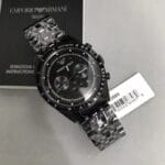 Détails de la montre Emporio Armani Tazio AR5989 noire avec son coffret au Maroc.