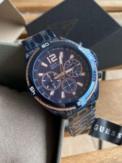 Montre Guess W1258G3 Surge bleue avec détails en or rose pour homme au Maroc.