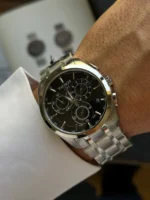 Tissot Couturier Chronograph T035.617.11.051.00 portée au poignet, boîtier acier 41 mm et cadran noir, style élégant homme Maroc