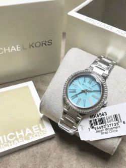 Montre Femme Michael Kors Taryn MK6563 dans sa boîte officielle, cadran nacre bleue, au Maroc.