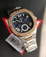 Détails de la montre Guess Headline GW0572G4 bicolore présentée dans son coffret au Maroc.