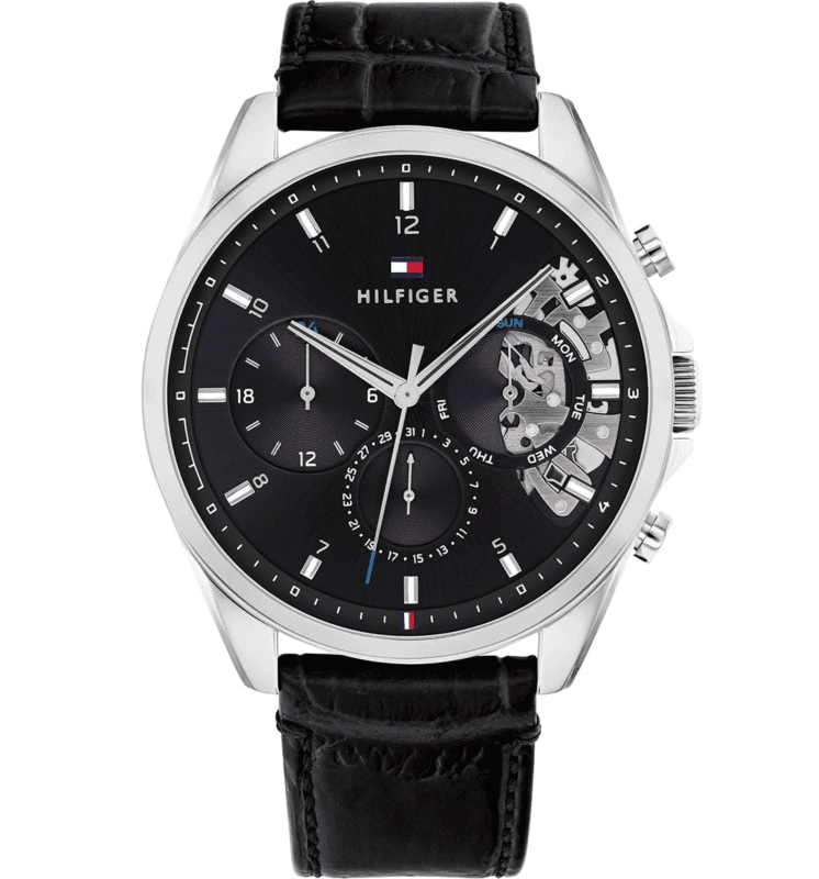 Montre Tommy Hilfiger Homme 1710449 Cadran noir avec détails squelette argentés, logo drapeau tricolore, index luminescents, sous-cadrans date et jour, bracelet cuir croco noir