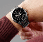 Vue de profil de la Montre Homme Hugo Boss Champion 1513819, montrant les poussoirs or rose et le bracelet bicolore.