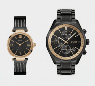 Meilleure idée cadeau Saint Valentin couple : coffret montres noir et or Hugo Boss et Guess.