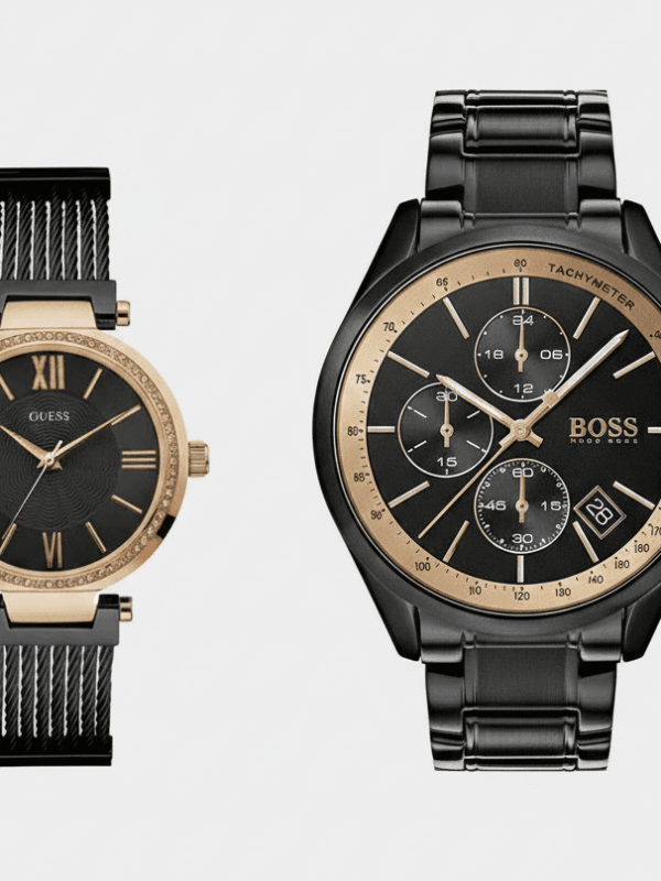 Meilleure idée cadeau Saint Valentin couple : coffret montres noir et or Hugo Boss et Guess.