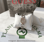 Montre femme GUESS GW0683L6 bicolore or et argent avec boîtier en forme de G et cristaux