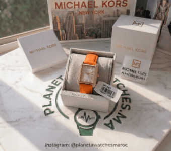 Montres pour femmes et hommes au Maroc Montre Michael Kors Emery MK2983 dorée et orange – Planetawatches sur Instagram