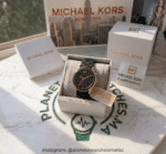 Montre Michael Kors Jessa MK7266 bicolore or et argent avec bracelet silicone logo noir pour femme au Maroc.