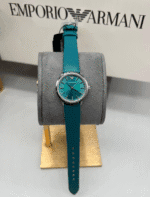 Montre Emporio Armani AR1804 Gianni T-Bar turquoise écrin officiel authentique PlanetaWatches Maroc.