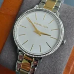 Cadran blanc de la Michael Kors MK1041 Pyper avec index dorés et détails pavés