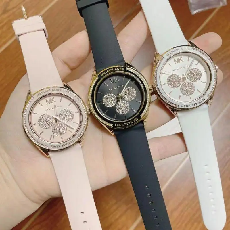 Montres femme Michael Kors Jessa MK6944 en trois couleurs blanc, noir et rose avec cadrans ornés de cristaux