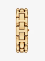 Dos du spectaculaire bracelet chaîne à maillons sculpturaux de la montre Michael Kors MK4921 dorée