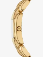 Profil du fin boîtier doré de la montre Michael Kors MK4921 avec couronne gravée du logo MK