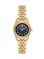 Montre Michael Kors MK4802 Lexington vue de face, boîtier doré, lunette cannelée et cadran bleu nuit pailleté