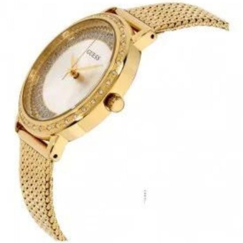 Marque: GUESS Modèle: Willow Boîtier: Diamètre : 36 mm Epaisseur : 10 mm Acier inoxydable Doré rose Cadran: Bleu Bracelet: Largeur : 16 mm Acier Inoxydable Doré rose Etanchéité: 30 m (3 ATM) Verre: Minéral Type de boucle: Boucle déployante