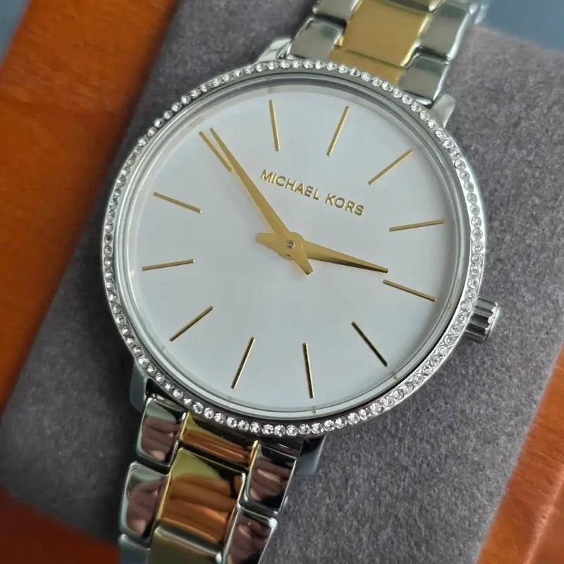 Cadran blanc de la Michael Kors MK1041 Pyper avec index dorés et détails pavés