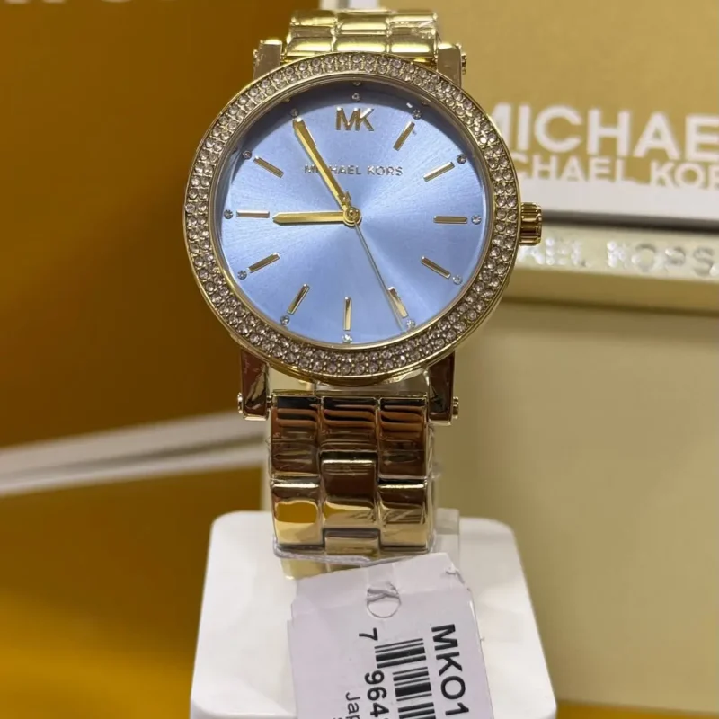 Montre femme Michael Kors MKO1048 dorée au cadran bleu présentée dans son écrin Michael Kors